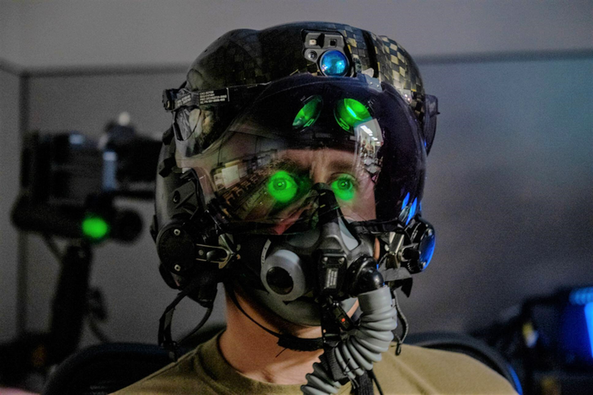 U.S. Air Force Tech. Sgt. Anthony Farnsworth, 419th Operations Support Squadron, poses for a photo to demonstrate the F-35 Generation III Helmet-Mounted Display at Hill Air Force Base, Utah, on July 10, 2021. The display provides the pilot critical inform