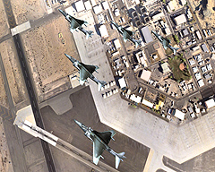 Three aircrafts flying over city scape