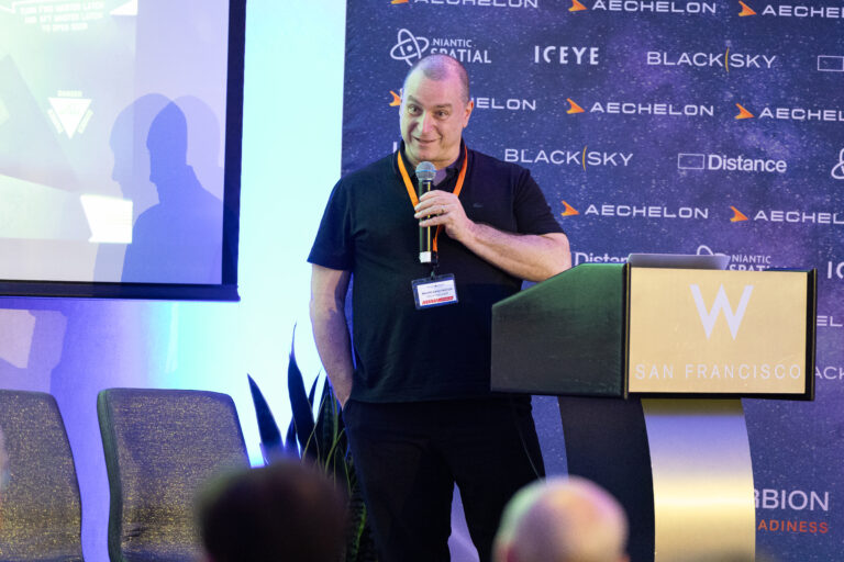 Man speaking at conference