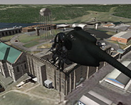 Helicopter flying over simulated city
