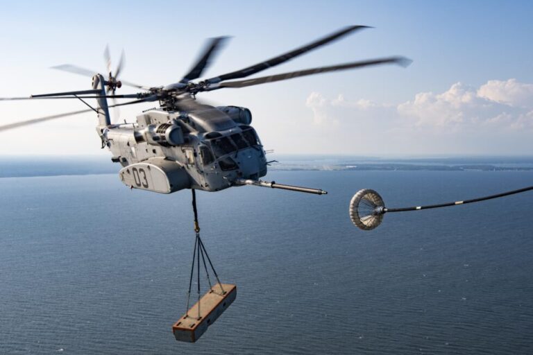 Helicopter maneuvering above ocean